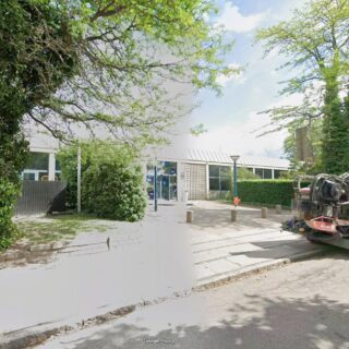 Bygning i Herlev med bjælkeberegning af bærende stålbjælker